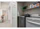 This laundry room has shelving and appliances included at 8266 Lincoln Valley St, Las Vegas, NV 89123
