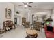 Spacious living room with traditional furniture, carpet, and ceiling fan at 8266 Lincoln Valley St, Las Vegas, NV 89123