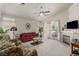 Bright and cozy living room with a fireplace and access to the backyard at 8266 Lincoln Valley St, Las Vegas, NV 89123