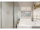 Bright bathroom with soaking tub and separate shower, ideal for relaxation and privacy at 8266 Lincoln Valley St, Las Vegas, NV 89123