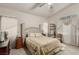 Spacious main bedroom features soft carpet, neutral walls, ceiling fan, and generous natural light at 8266 Lincoln Valley St, Las Vegas, NV 89123
