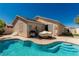 Backyard pool with a well-maintained patio, perfect for outdoor relaxation and entertainment at 8266 Lincoln Valley St, Las Vegas, NV 89123
