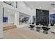 Bright and modern living room featuring a black marble fireplace and an open-concept floor plan at 8717 Kingship Ct, Las Vegas, NV 89129