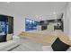 Bright open-concept home with kitchen, seamless access to the pool area at 8717 Kingship Ct, Las Vegas, NV 89129