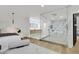 The main bedroom flows into a modern bathroom with sleek glass shower and dual vanity at 8717 Kingship Ct, Las Vegas, NV 89129