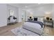 Comfortable main bedroom with neutral tones, stylish furniture, and modern decor at 8717 Kingship Ct, Las Vegas, NV 89129