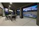 Outdoor living area with patio furniture, dining table, and covered space for entertaining at 8717 Kingship Ct, Las Vegas, NV 89129