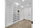 Bright and spacious walk-in closet with custom shelving and drawers for optimal storage at 8717 Kingship Ct, Las Vegas, NV 89129