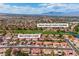 Aerial view of a residential area close to the Palm Valley Golf Course with mountain views at 8812 Stoney Point Dr, Las Vegas, NV 89134