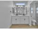Stylish bathroom features a double vanity and modern fixtures at 8812 Stoney Point Dr, Las Vegas, NV 89134