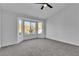 Bedroom with bay window and plush neutral carpet at 8812 Stoney Point Dr, Las Vegas, NV 89134