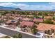 Scenic neighborhood view with well-maintained homes, desert landscaping, and a mountain backdrop at 8812 Stoney Point Dr, Las Vegas, NV 89134