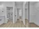 View of a hallway with open doors to the bathroom and closet at 8812 Stoney Point Dr, Las Vegas, NV 89134