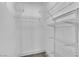 Organized walk-in closet with white shelving at 8812 Stoney Point Dr, Las Vegas, NV 89134