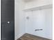 Clean laundry area features shelving and modern hookups, ready for appliances at 887 W Carey Ave, North Las Vegas, NV 89030