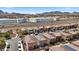 Aerial view of a residential area with mountain views and easy highway access at 922 Harbor Ave, Henderson, NV 89002