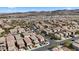Wide aerial view of a densely populated residential area with desert landscape at 922 Harbor Ave, Henderson, NV 89002