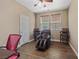 Comfortable bedroom featuring dark wood floors and natural light at 922 Harbor Ave, Henderson, NV 89002