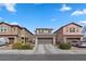 Two-story home featuring a two-car garage and low maintenance landscaping at 922 Harbor Ave, Henderson, NV 89002