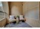 Private balcony with cozy seating, perfect for relaxing and enjoying the outdoors at 10001 Peace Way # 1321, Las Vegas, NV 89147