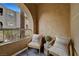 Cozy balcony setting, perfect for relaxing with comfortable seating and stylish decor at 10001 Peace Way # 1321, Las Vegas, NV 89147