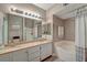 Well-appointed bathroom with a soaking tub, double vanity, and modern fixtures, offering a spa-like experience at 10001 Peace Way # 1321, Las Vegas, NV 89147