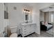 Bright bathroom with a sleek vanity, illuminated mirror, and modern fixtures, offering a clean aesthetic at 10001 Peace Way # 1321, Las Vegas, NV 89147