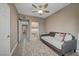 Neutral bedroom featuring a ceiling fan, wood floors, and updated closet at 10001 Peace Way # 1321, Las Vegas, NV 89147