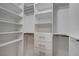 Spacious walk-in closet featuring custom shelving and ample storage for organized living at 10001 Peace Way # 1321, Las Vegas, NV 89147