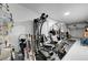 Functional garage with water heater and a variety of exercise equipment at 10001 Peace Way # 1321, Las Vegas, NV 89147