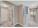 Hallway view of the open floor plan with closet and decorative accents at 10001 Peace Way # 1321, Las Vegas, NV 89147