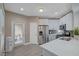 Bright kitchen features white cabinets, stainless appliances, and stone countertops at 10001 Peace Way # 1321, Las Vegas, NV 89147