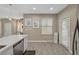 Bright and airy kitchen open to the living area, featuring stainless steel appliances at 10001 Peace Way # 1321, Las Vegas, NV 89147