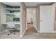 Functional office space featuring built-in shelves and desk for efficient work-from-home setup at 10001 Peace Way # 1321, Las Vegas, NV 89147
