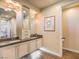 Bathroom with double sinks, plenty of cabinet space, and attractive decor at 10398 Addie De Mar Ln, Las Vegas, NV 89135