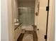 Cozy bathroom with a shower-tub, stylish vanity, and decorative accessories at 10398 Addie De Mar Ln, Las Vegas, NV 89135