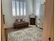 Charming bedroom with plush decor, a decorative rug, and abundant natural light at 10398 Addie De Mar Ln, Las Vegas, NV 89135