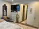 Primary bedroom featuring stylish furnishings, ample natural light, and elegant decor at 10398 Addie De Mar Ln, Las Vegas, NV 89135