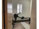 Bright exercise room with hardwood floors and an indoor rowing machine at 10398 Addie De Mar Ln, Las Vegas, NV 89135