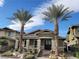 Charming home exterior featuring manicured landscaping, a welcoming entrance, and modern architectural details at 10398 Addie De Mar Ln, Las Vegas, NV 89135