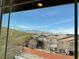Scenic view of the neighborhood and surrounding mountains from a window at 10398 Addie De Mar Ln, Las Vegas, NV 89135