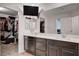 Stylish bathroom features a double sink vanity, large mirror, and a walk-in closet at 105 Campbelltown Ave, Henderson, NV 89015