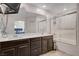 Bathroom with double vanity, plenty of storage, and tub-shower combo at 105 Campbelltown Ave, Henderson, NV 89015