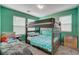 bedroom with bunk beds and bright teal walls at 105 Campbelltown Ave, Henderson, NV 89015