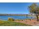 A community lake view shows the lake bordered by grass, walkways, and landscaping at 105 Campbelltown Ave, Henderson, NV 89015