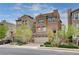 Beautiful two-story home with a two-car garage, modern design, and a well-maintained front yard at 105 Campbelltown Ave, Henderson, NV 89015