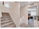 Carpeted staircase leading to the upper level, showcasing the home's layout at 105 Campbelltown Ave, Henderson, NV 89015