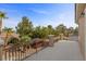 This balcony offers a relaxing outdoor space with iron railings and mature landscaping views at 10748 Aldrovandi Dr, Las Vegas, NV 89141