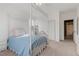 Cozy bedroom features a decorative canopy bed, closet space, and relaxing decor at 10748 Aldrovandi Dr, Las Vegas, NV 89141