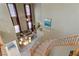 Grand living space featuring soaring ceilings, a staircase, and lots of natural light at 10748 Aldrovandi Dr, Las Vegas, NV 89141